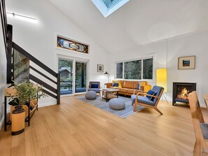 TV, fireplace, books, offices