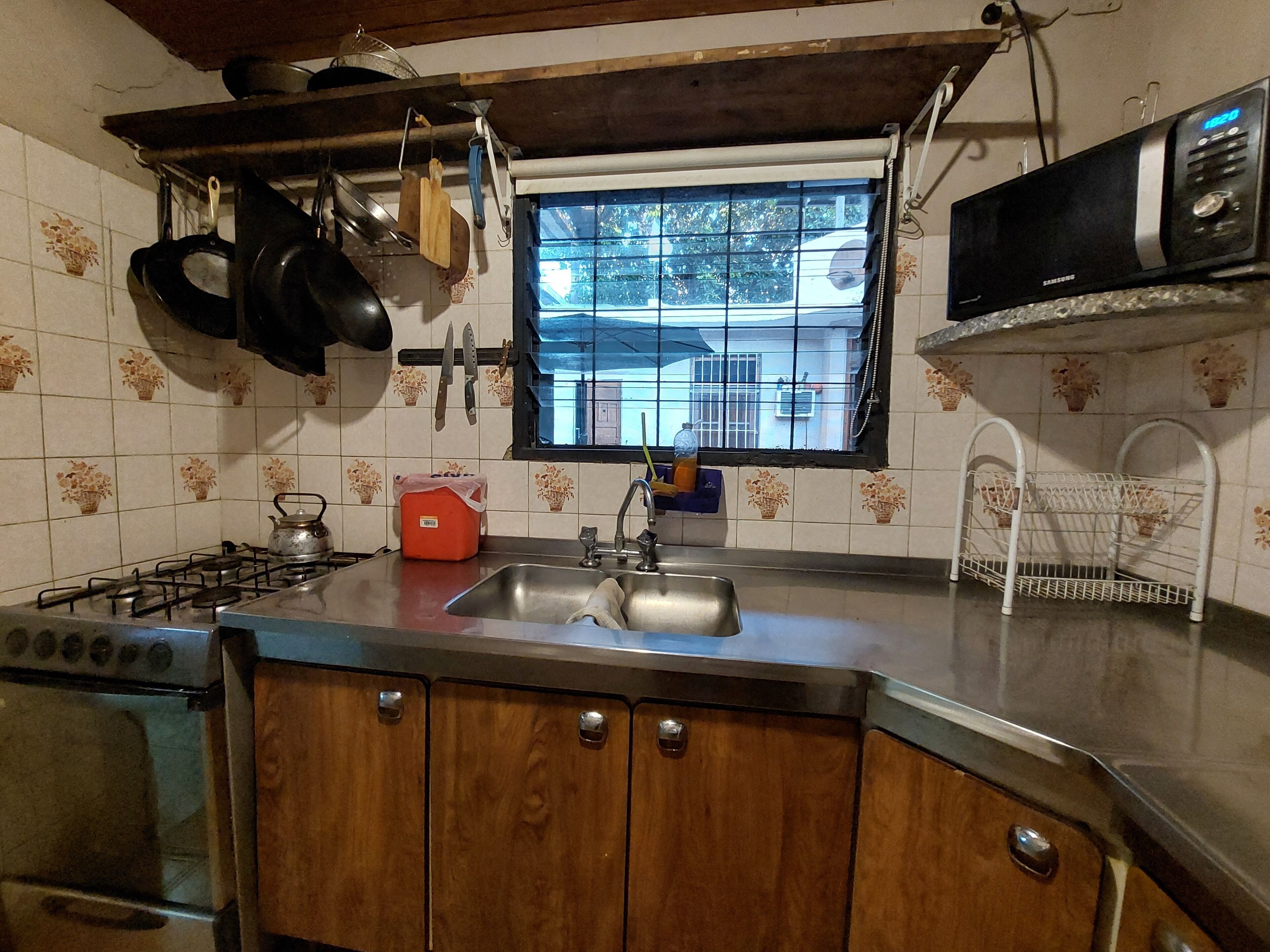 Fridge, microwave, cookware/dishes/utensils, spices