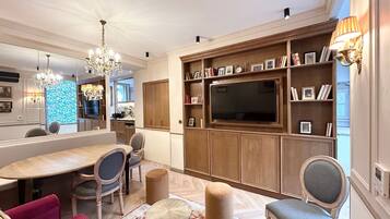 Apartment, Courtyard View | Living area | 43-inch Smart TV with cable channels, Netflix, streaming services