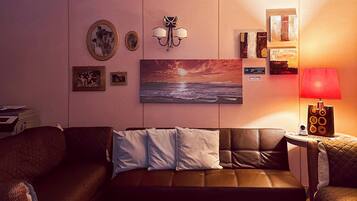 Suite, 3 chambres, non-fumeur | Coin séjour