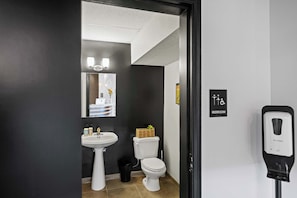 Shower, hair dryer, towels, shampoo