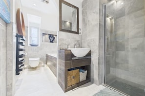Shower, hair dryer, towels, soap