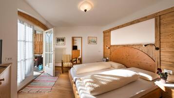 2 habitaciones, tabla de planchar con plancha y ropa de cama