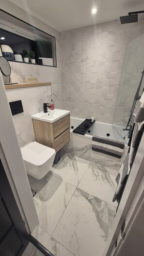 Hair dryer, towels, soap, shampoo