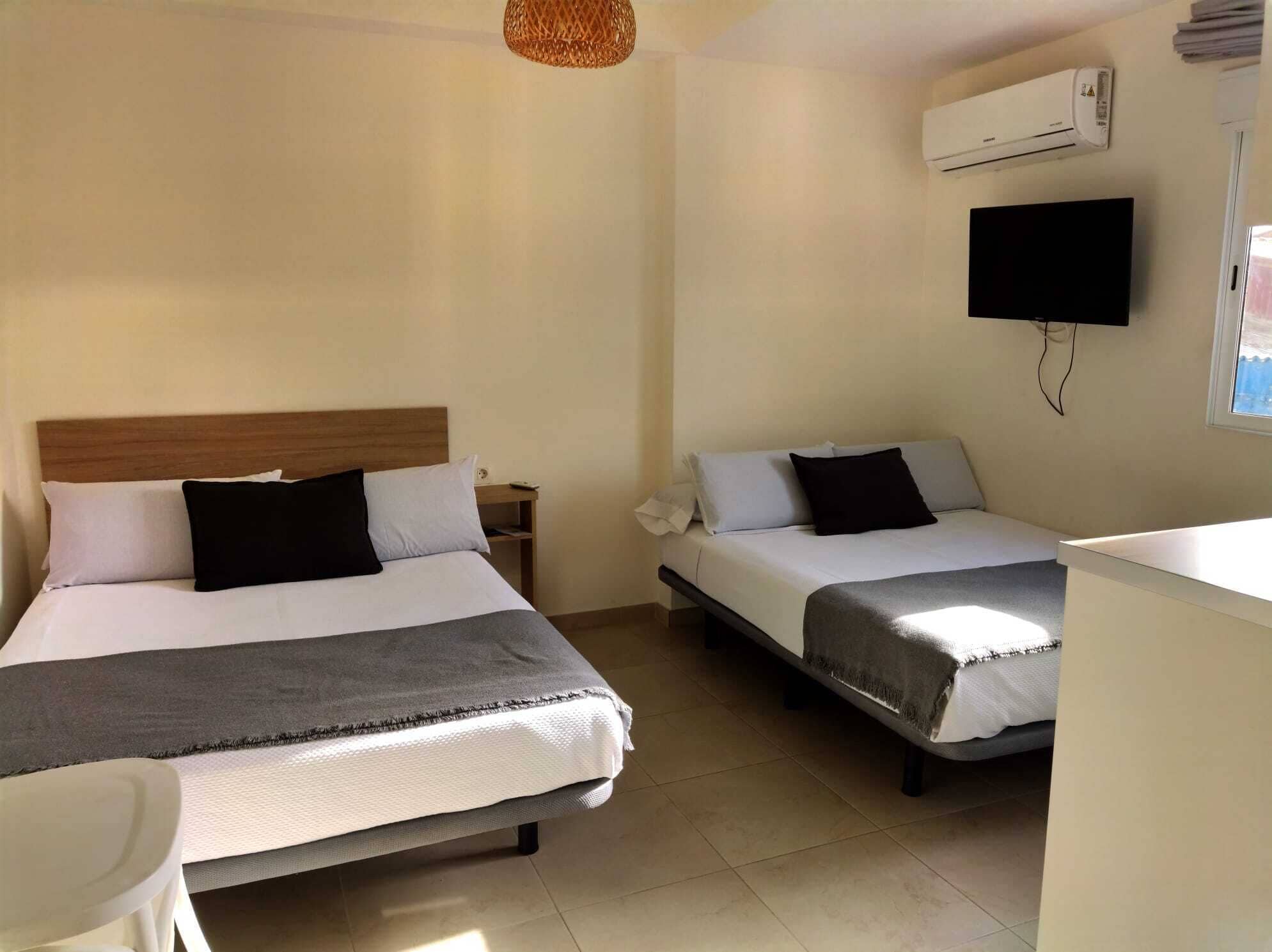 Habitación doble, 2 camas matrimoniales | Wifi gratis 