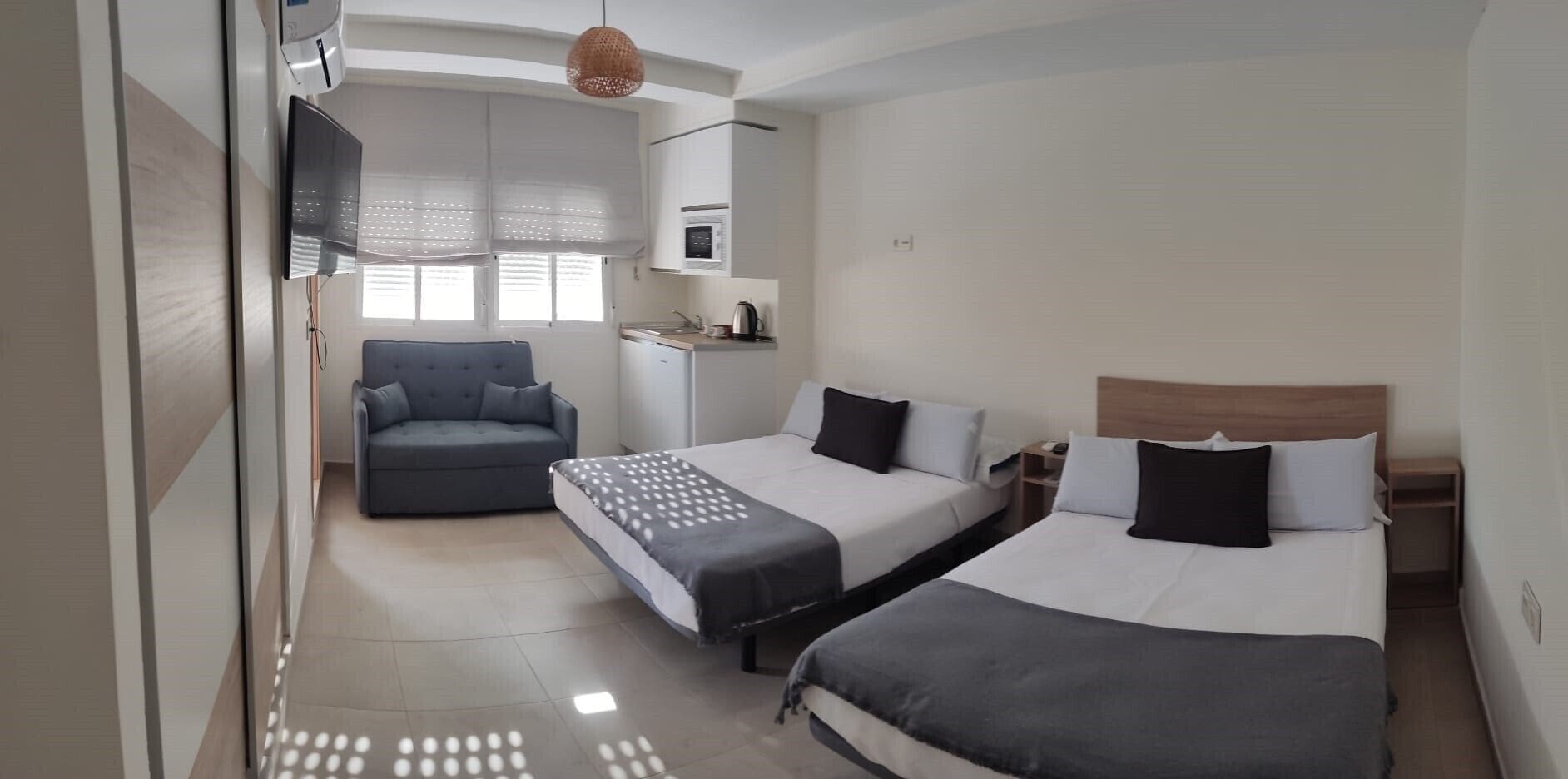 Habitación doble, varias camas | Wifi gratis 