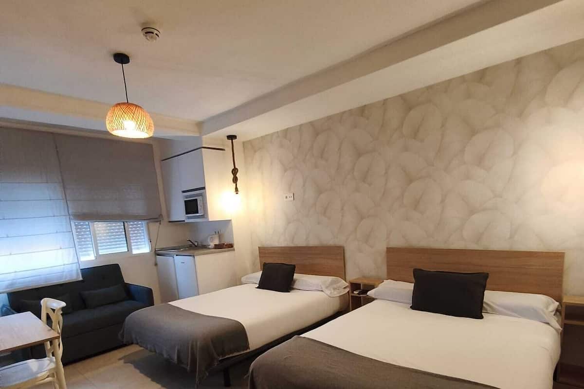 Habitación doble, varias camas | Wifi gratis