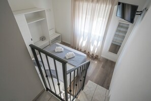 1 chambre, coffres-forts dans les chambres, fer et planche à repasser