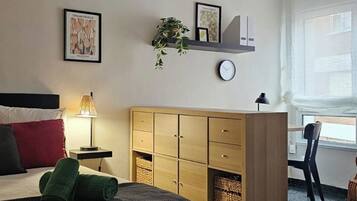 Fer et planche à repasser, lit parapluie, Wi-Fi, draps fournis