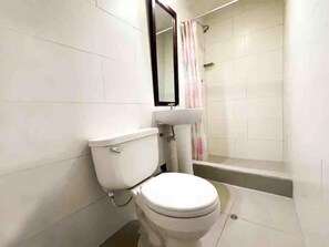 Shower, towels, soap, toilet paper