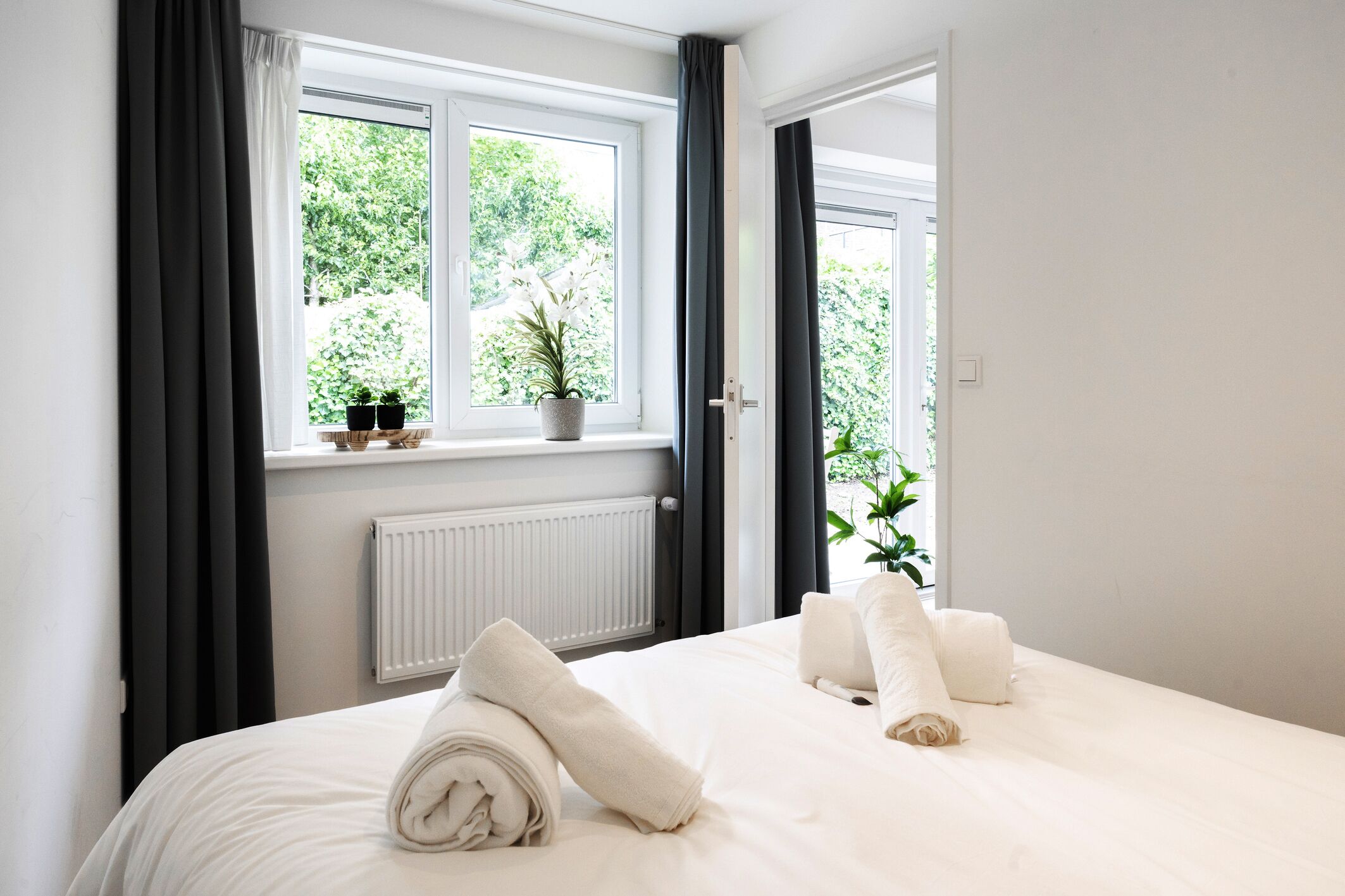 1 bedroom, desk, iron/ironing board, travel crib