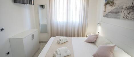 مكواة/لوح كي وواي فاي وملاءات أسرّة