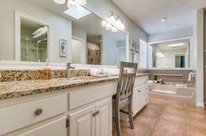 Shower, jetted tub, hair dryer, towels