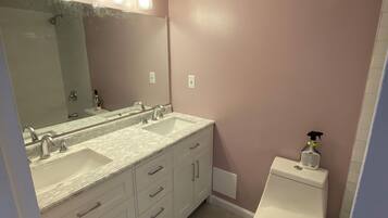 Hair dryer, towels, soap, toilet paper