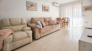 Apartment, 2 Bedrooms, Balcony, Pool View | Living room