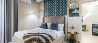 Suite Nnyana | Pool | 55" TV Netflix | 5 mins Mall