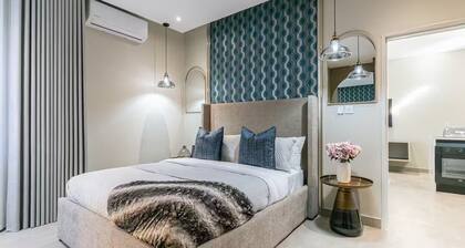 Suite Nnyana | Pool | 55" TV Netflix | 5 mins Mall