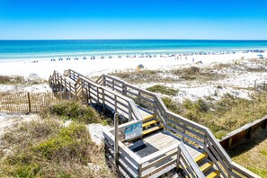 A wooden boardwalk leading to a beach with clear skies and calm waters. - Beachside 2 bed w/gulf views Mainsail 341 with free beach service for 2! (Miramar Beach)