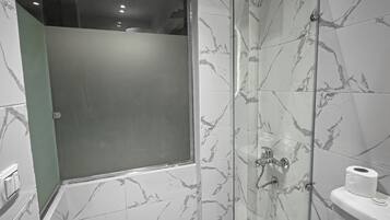 Shower, hair dryer, slippers, towels