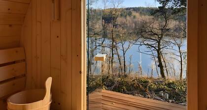 Ferienhaus 219 mit Seeblick, privater Terrasse und WLAN