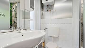 Chuveiro, secador de cabelo