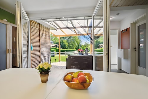 Ferienhaus 35 mit privater Terrasse, Gemeinschaftsgarten und WLAN