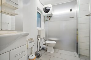 Douche, sèche-cheveux