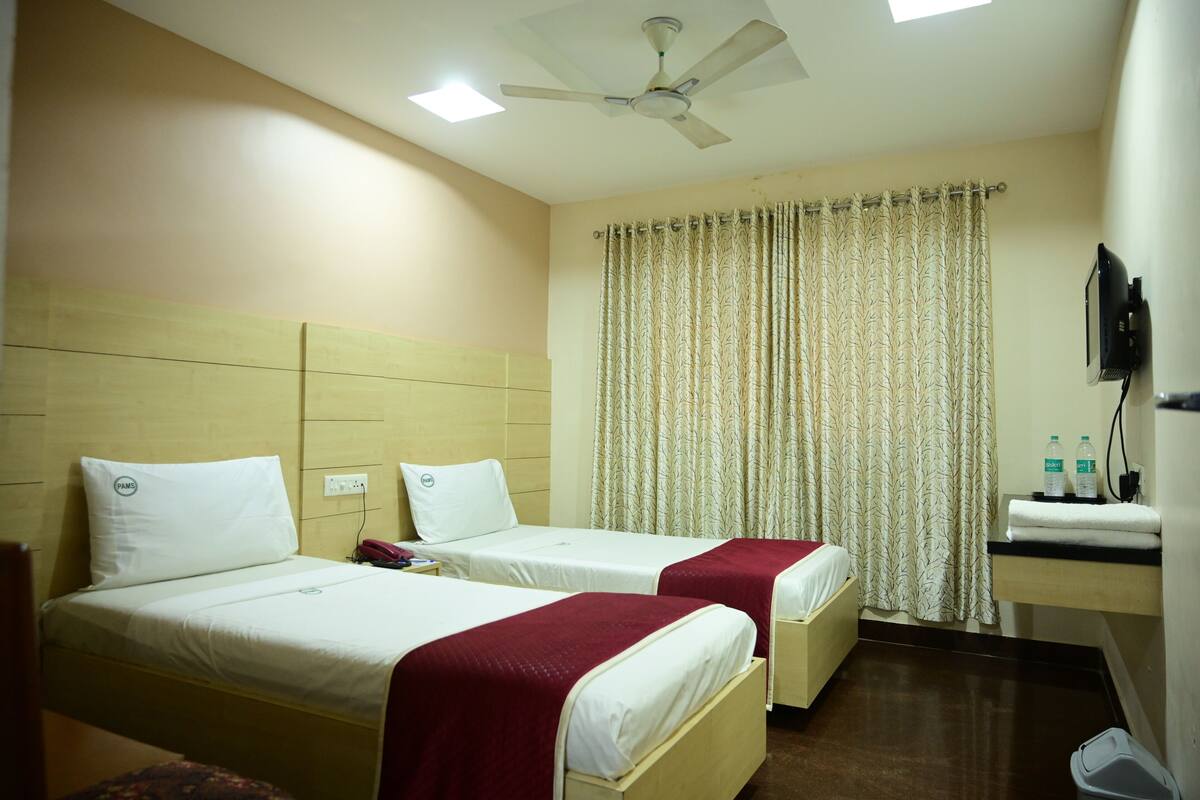Chambre Deluxe avec lits jumeaux | Accès au Wi-Fi (inclus)