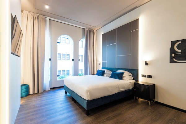 Deluxe Quadruple Room | Egyptian cotton sheets, premium bedding, down comforters, pillowtop beds