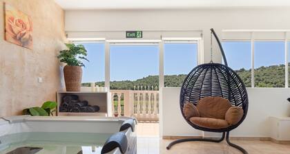 Appartement 'Casa Zophora' avec vue sur la montagne, Wi-Fi et climatisation