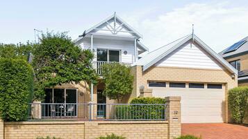 Traditional home exterior with a cozy and inviting atmosphere.