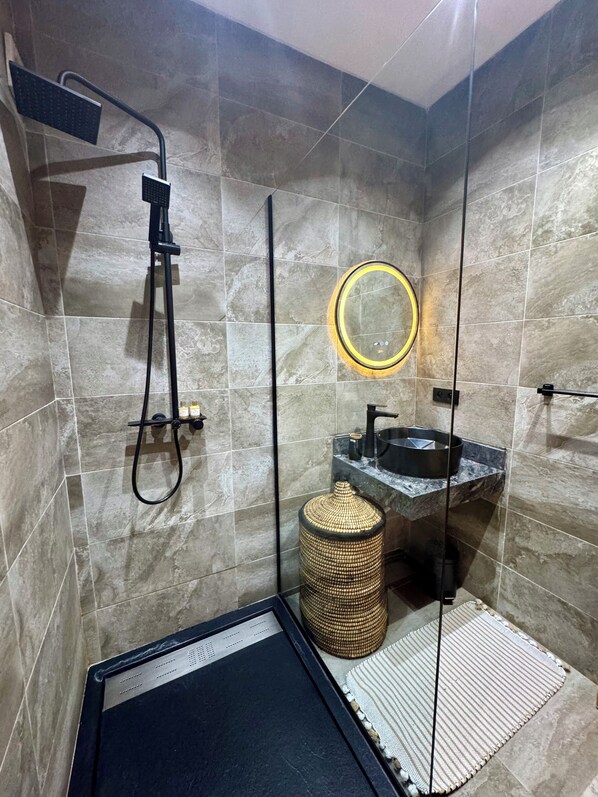 Shower, hair dryer, towels, soap