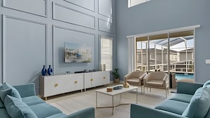 Een moderne woonkamer met een bank, salontafel en kast. Er hangt een schilderij aan de muur en er is een raam met jaloezieën.