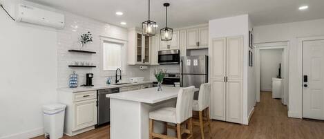Coffee/tea maker, fridge, microwave, oven