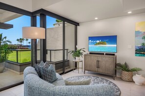 TV, books - Beautifuly Renovated w/Ocean Views + Golf Discounts | Mauna Lani Point F206 (Kamuela)