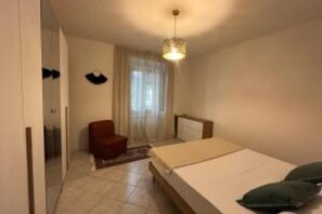 Fer et planche à repasser, draps fournis