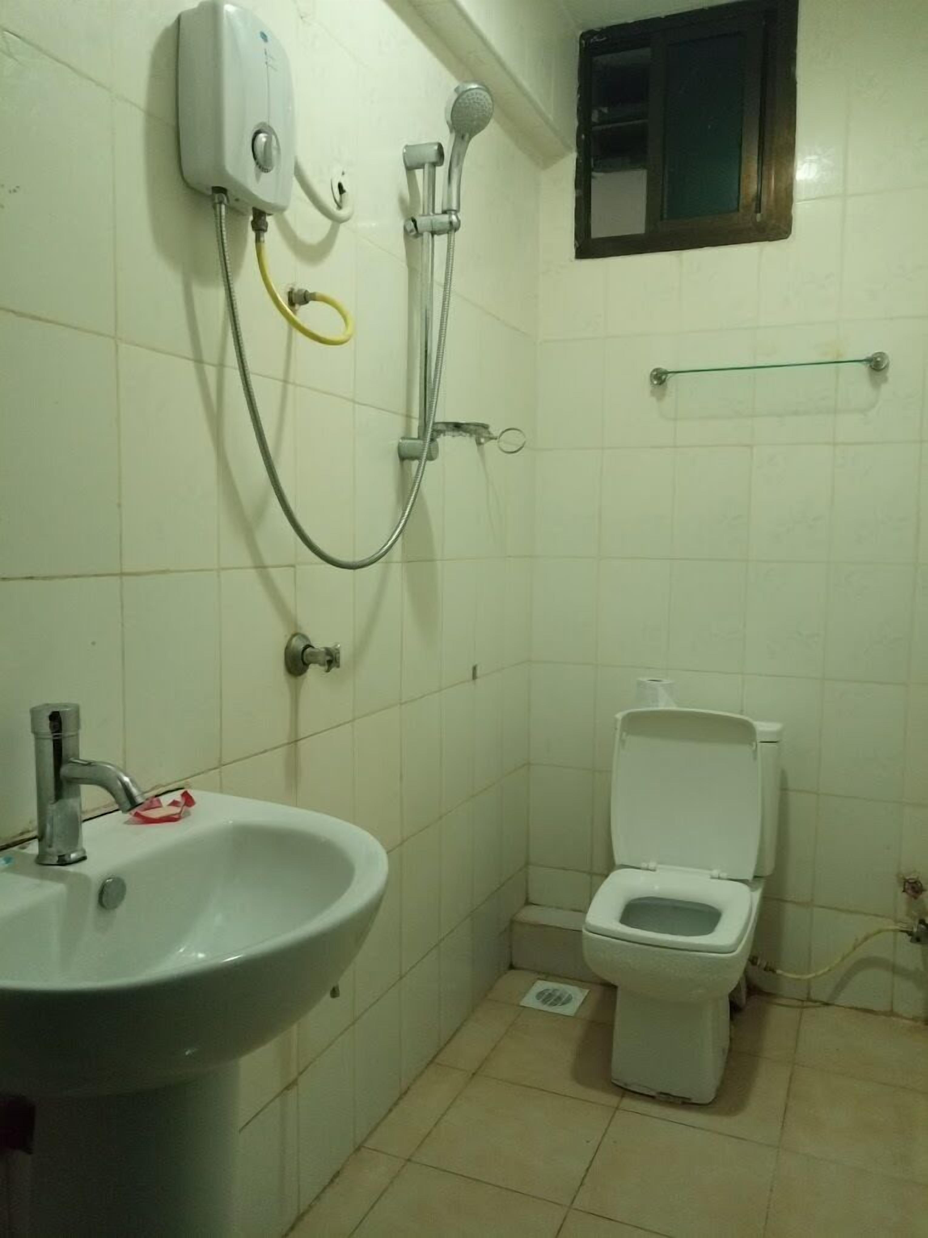 Deluxe Double Room, City View | Bathroom | Shower, slippers, towels, soap