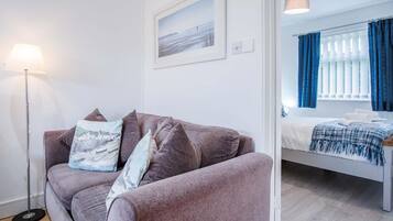 Chalet (2 Bedrooms) | Living area | TV, DVD player