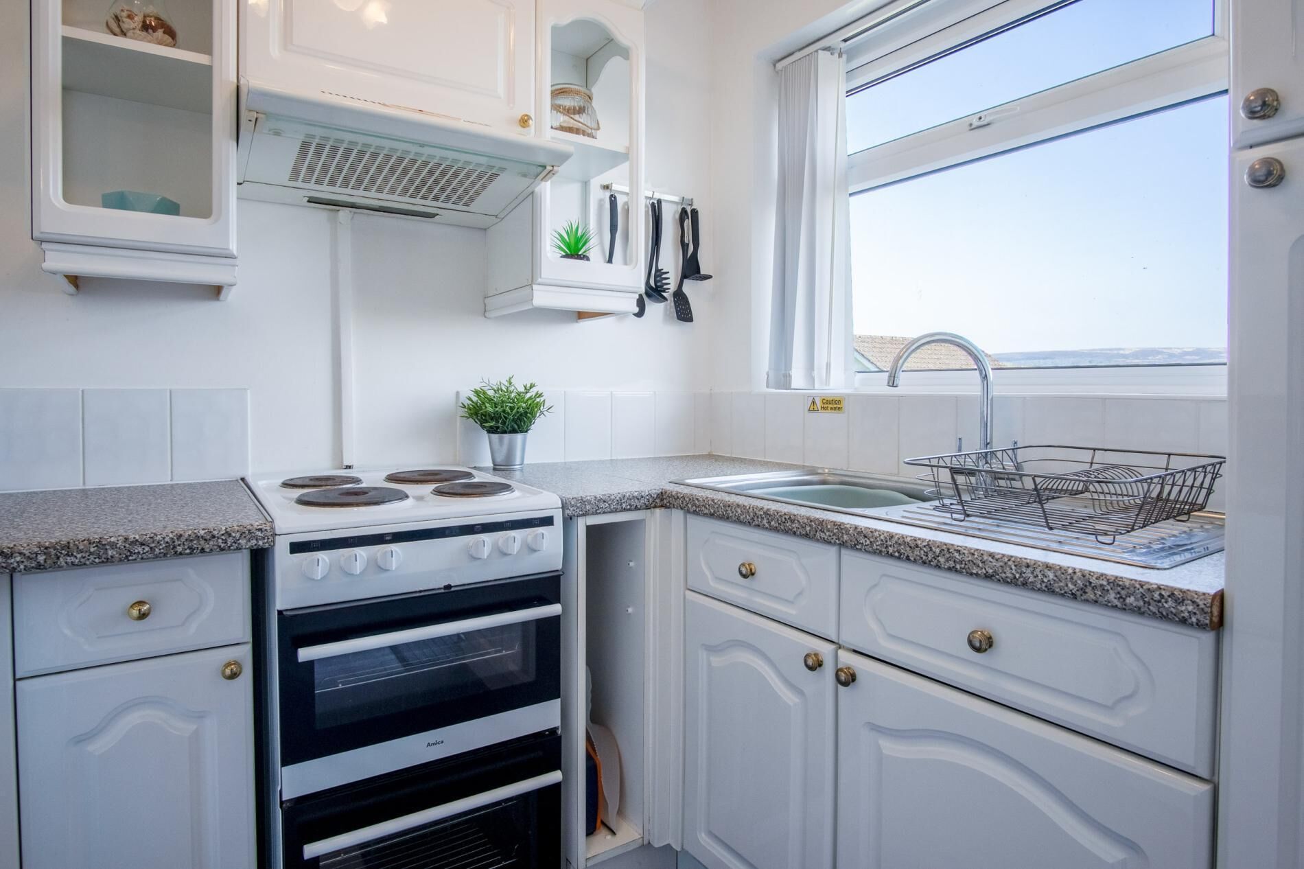 Microwave, oven, dining tables