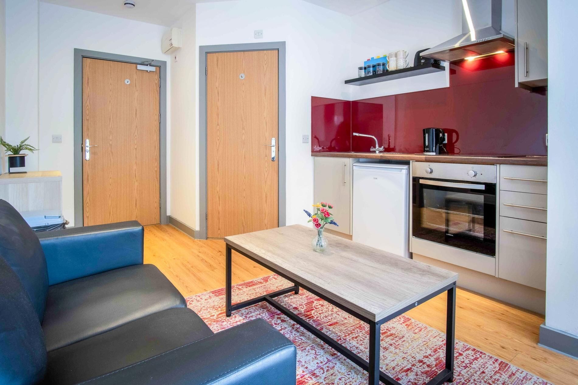 Apartment (0 Bedroom) | Living area | 32-inch TV with digital channels