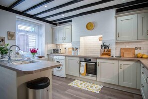 Cottage (3 Bedrooms) | Private kitchen | Microwave, oven, highchair, blender - Rose Cottage - 3 Bedroom - Murton Mumbles (Swansea)