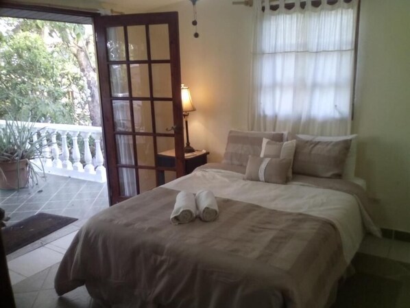 Queen Room (Shared Bath)