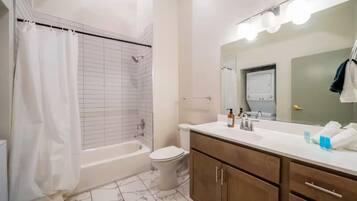 Hair dryer, towels, soap, toilet paper