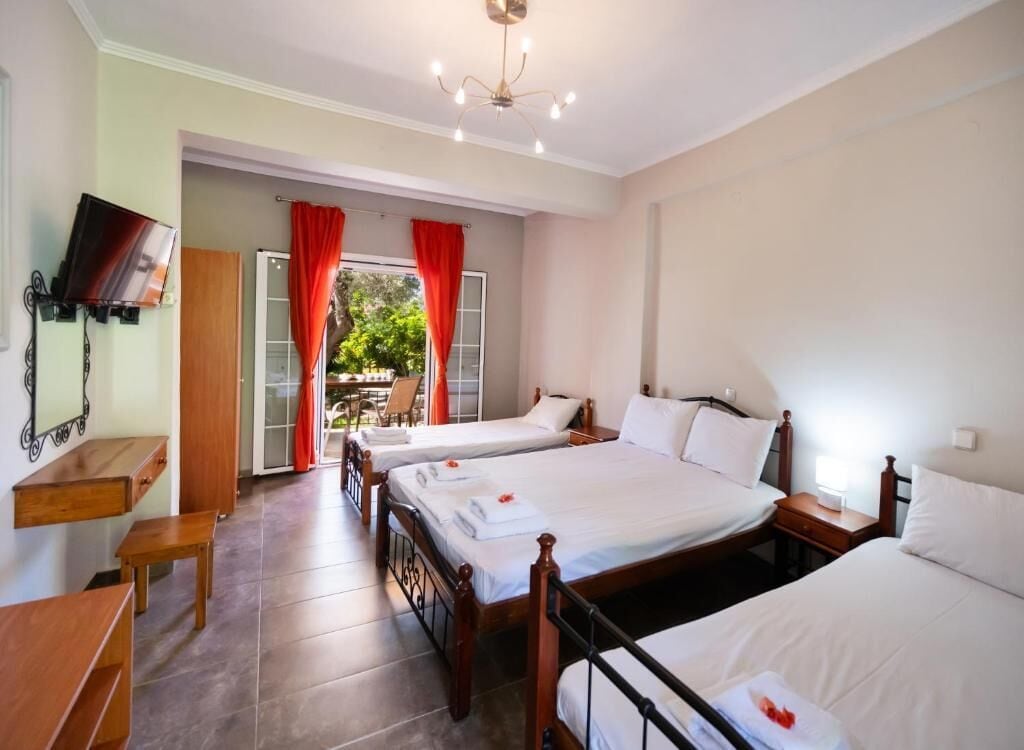 Quadruple Room, Courtyard View | Blackout curtains, iron/ironing board, free WiFi