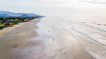 On the beach, white sand, 2 beach bars