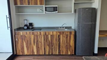 Comfort Apartment, 3 Bedrooms, Balcony | Private kitchen | Full-size fridge, microwave, stovetop, cookware/dishes/utensils