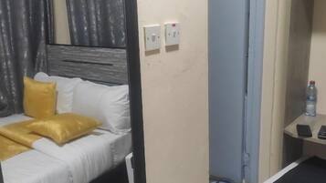 Deluxe Single Room | Free WiFi, bed sheets