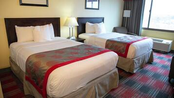 Tabla de planchar con plancha, wifi y ropa de cama