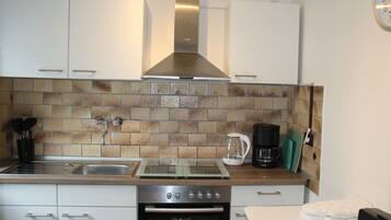 KylskÄp, mikrovÄgsugn, ugn och spishÀll