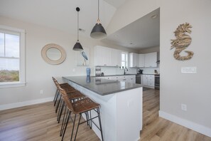 Fridge, microwave, oven, stovetop - 6103 - Sunset Estate, Spacious 6BR semi-oceanfront home in Nags Head, perfect for 12 guests. (Nags Head)